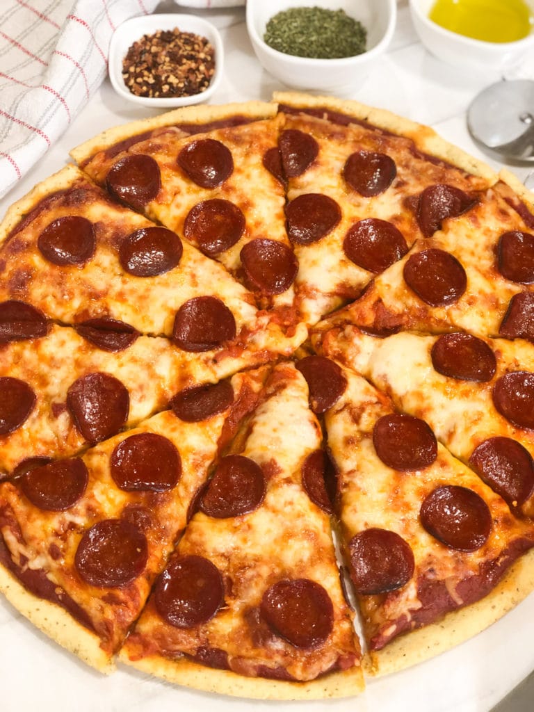Close up of whole pizza