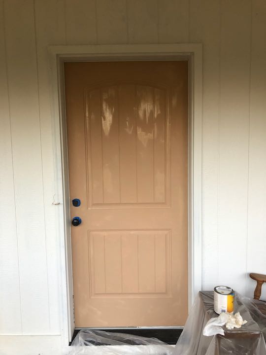 Front door with light tan base coat