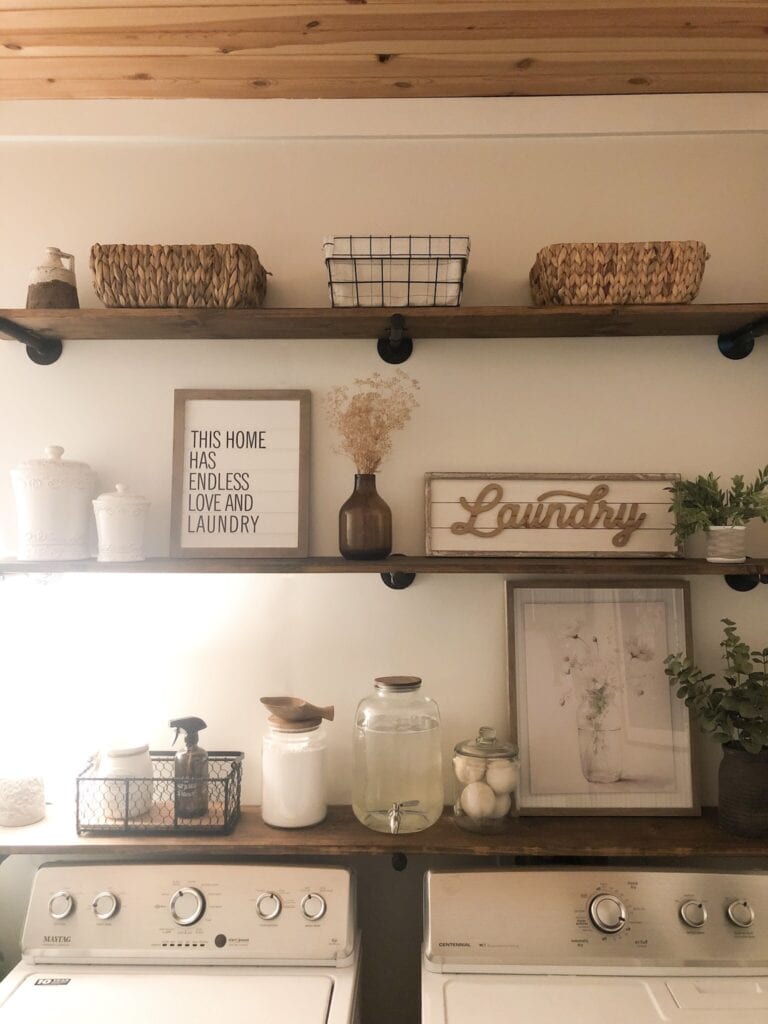 The finished beautiful decorated shelves with a cozy lamp