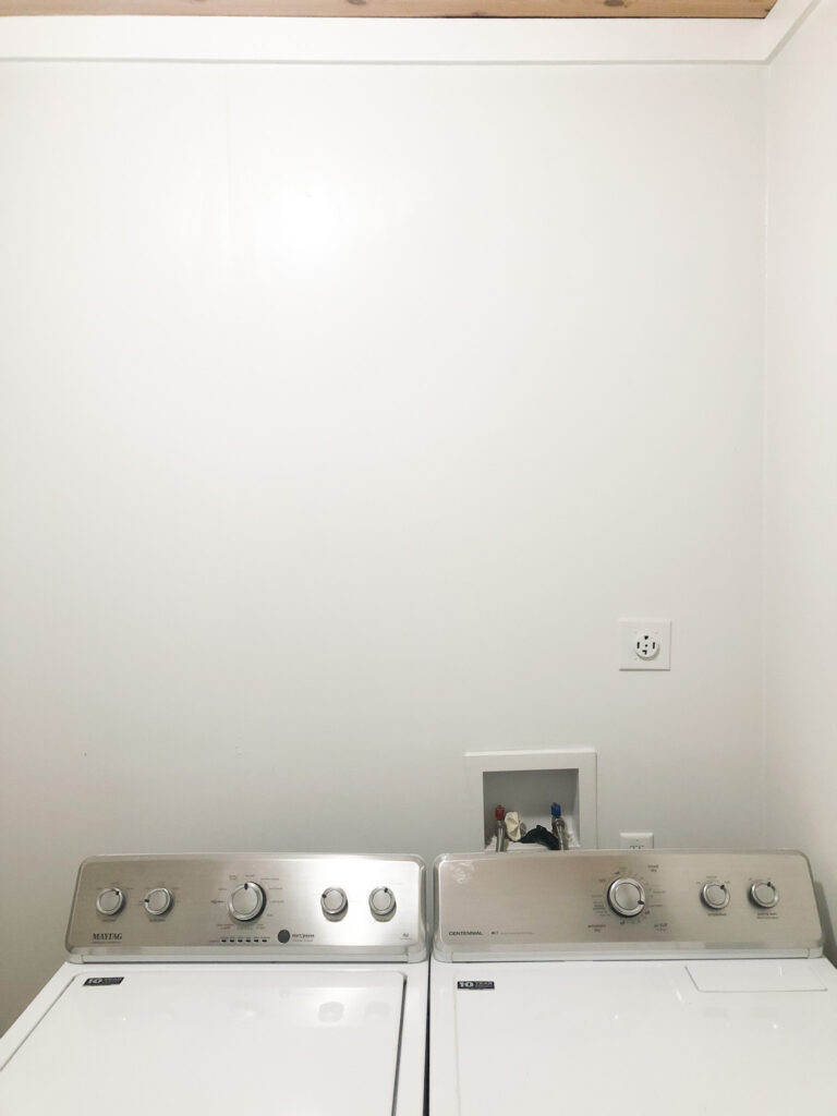 Laundry room before without the shelving
