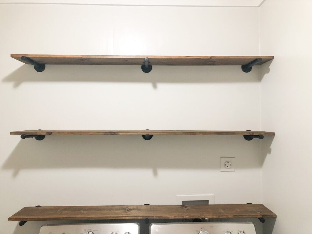 All three shelves on the wall