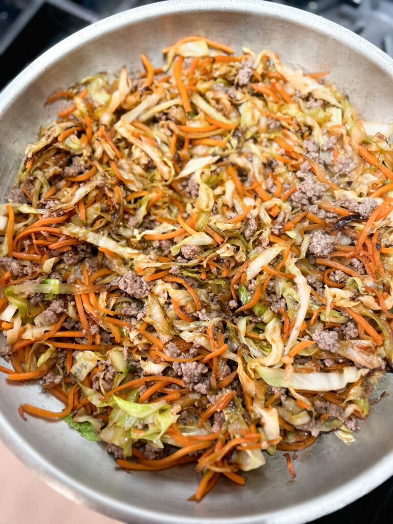 Egg Roll In A bowl cooking in a pan